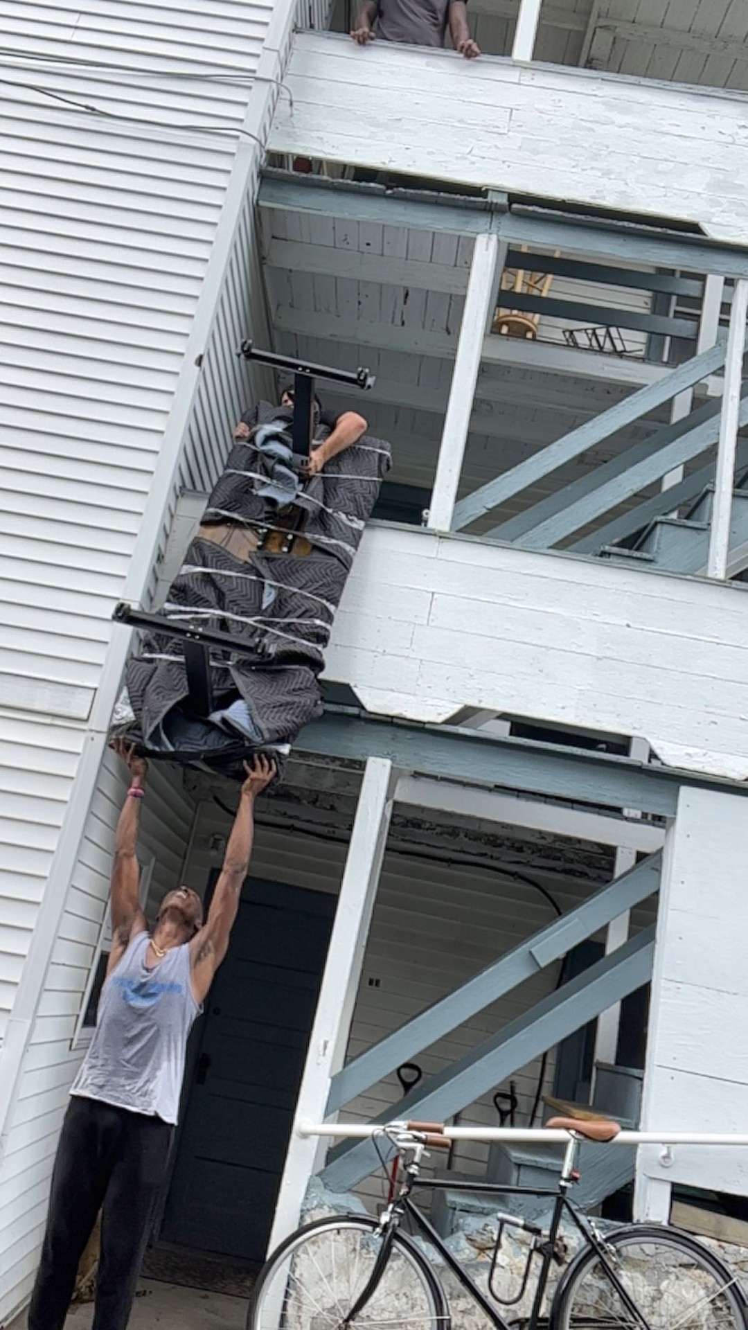 Third-floor hoist — whatever the job takes